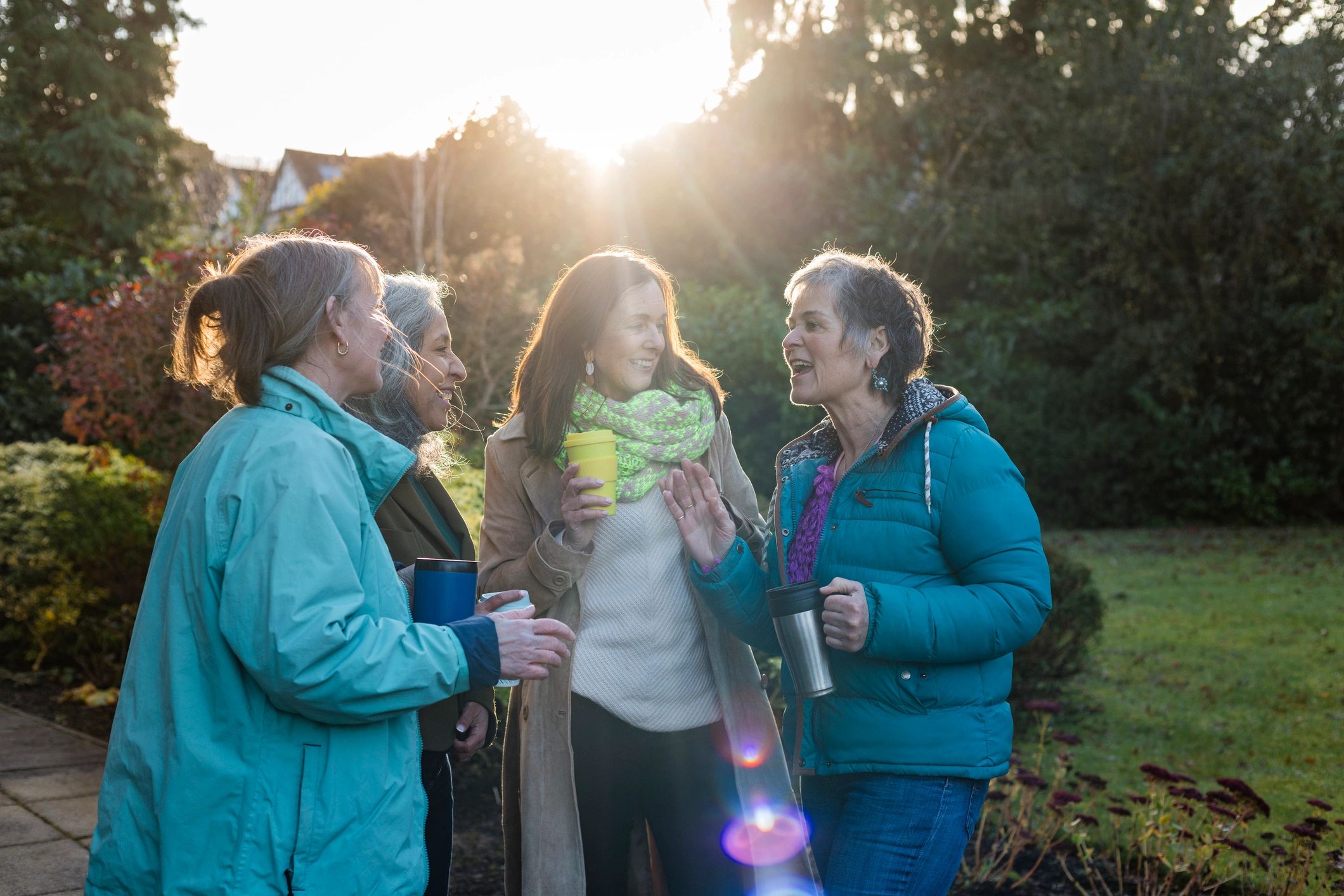 Adult family members together outdoors in a calm, supportive setting